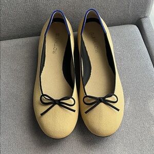 Rothy's Yellow Ballet Flats with Black Trim and Bow